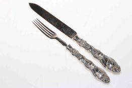 Ornate Victorian silver serving knife and fork.
