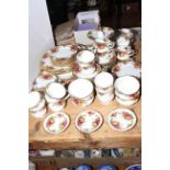 Eighty pieces of Royal Albert Old Country Roses tea china, including cakestand and serving plates.