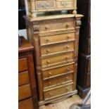 Continental pine seven drawer chest, 71cm by 137cm.