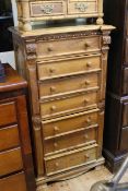 Continental pine seven drawer chest, 71cm by 137cm.