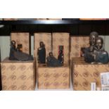 Seven boxed Maasai Soul Journeys Sculptures by Stacy Bayne.