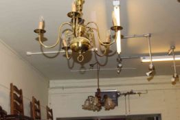 Brass hanging ceiling light with ruby glass shade,