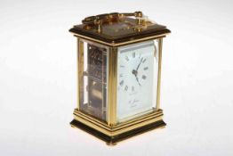 Gilt brass carriage clock, the striking movement signed St. James, London.