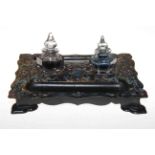 Victorian papier mache inkstand with mother of pearl inlay and two hexagonal bottles.