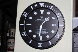 Rolex style circular kitchen clock.