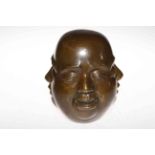 Four face Buddha sculpture.