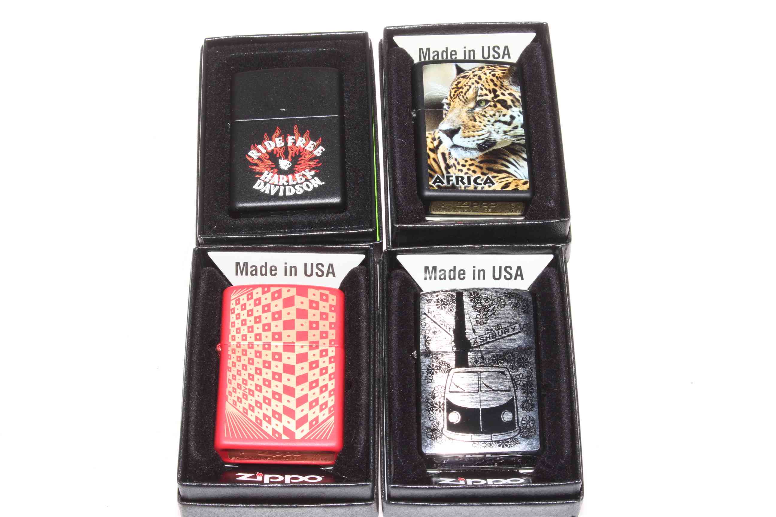 Four boxed Zippo lighters, as new.