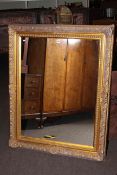 Gilt framed wall mirror, 125cm by 100cm overall.