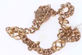 9 carat gold chain link bracelet.