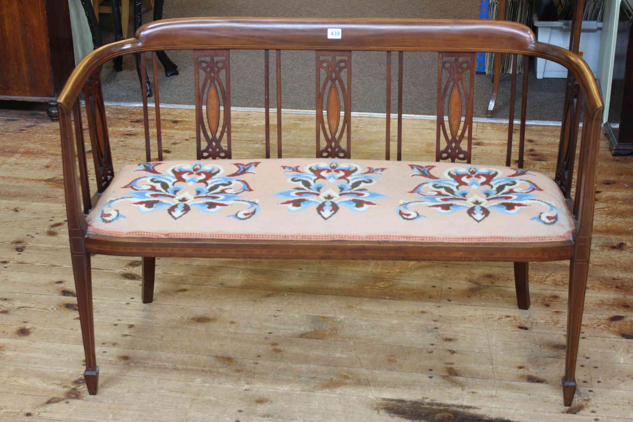 Edwardian mahogany and satinwood inlaid occasional settee, 111cm long.