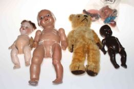 Vintage teddy bear and collection of dolls including bisque head doll.