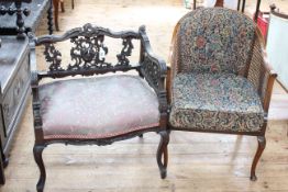 Late Victorian fretwork carved occasional chair on cabriole legs and later cane panelled occasional