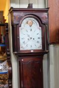 Antique mahogany eight day longcase clock having arched moon phase dial.