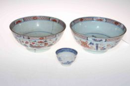 Two antique Chinese blue and iron red bowls and a tea bowl (3).