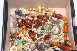 Box of jewellery, mostly necklaces.