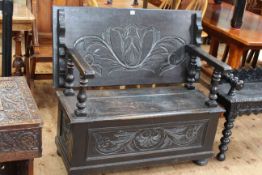 Carved oak monks bench.