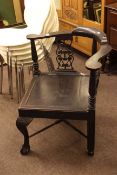 Late 19th Century ebonised Chippendale style corner elbow chairs.