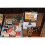 Collection of vintage playing cards, chess pieces, etc.