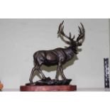 Bronzed effect model of a Stag on wood plinth, 40cm by 48cm.