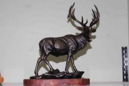Bronzed effect model of a Stag on wood plinth, 40cm by 48cm.