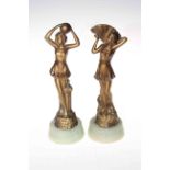 Pair Art Deco spelter figures of girls with fan and ball, 26.5cm.