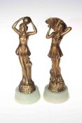 Pair Art Deco spelter figures of girls with fan and ball, 26.5cm.