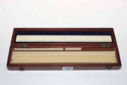 Set of ivory rules by Elliott Bros. London, in mahogany fitted case, 36cm across.