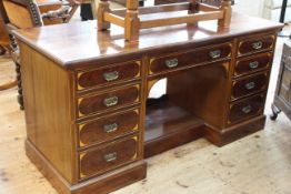 Late Victorian mahogany and satinwood nine drawer pedestal dressing table, 75cm by 153cm.