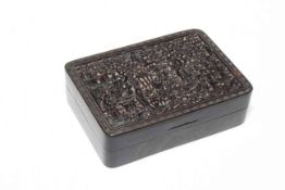 19th Century tortoiseshell box with profusely carved lid, 9.5cm across.