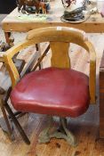 Vintage cast base revolving chair.