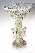 Dresden porcelain centre piece with winged cherubs and encrusted flower decoration, 42cm.