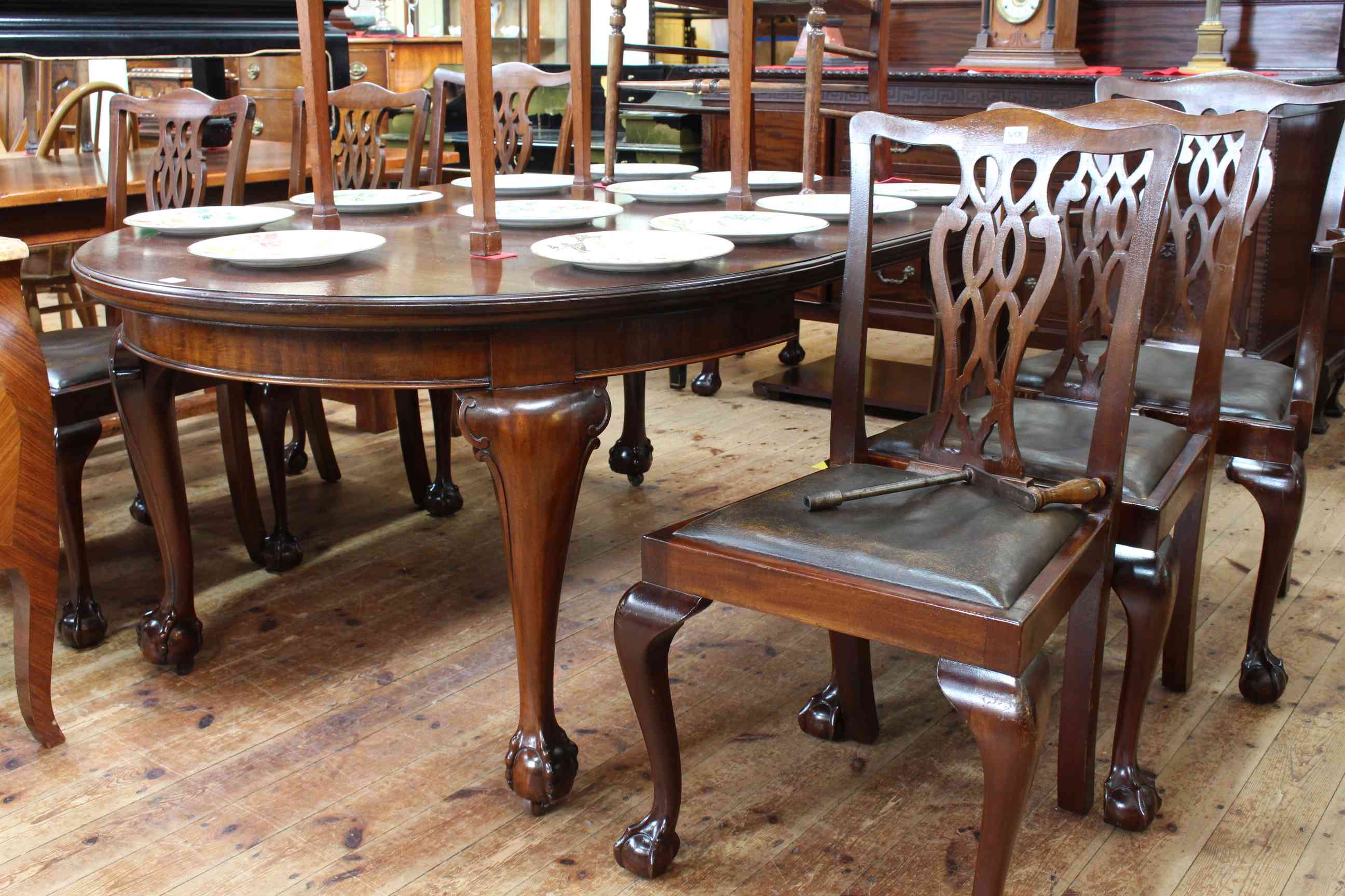 Early 19th Century mahogany Chippendale style eight piece dining suite comprising two door