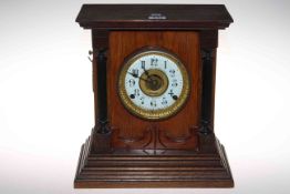 Mahogany cased mantel clock with enamel dial by Fattorini and Sons, Bradford, 34cm by 32cm.