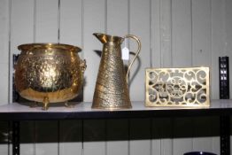 Brass jardiniere, brass trivet and a brass jug (3).