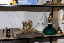 Two corinthian column oil lamps, brass oil lamp, four brass bell weights, three wood planes,