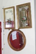 Circular gilt framed bevelled wall mirror and pair etched wall mirrors (3).