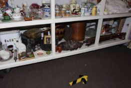Full shelf of collectables including walking sticks, Imari plates,
