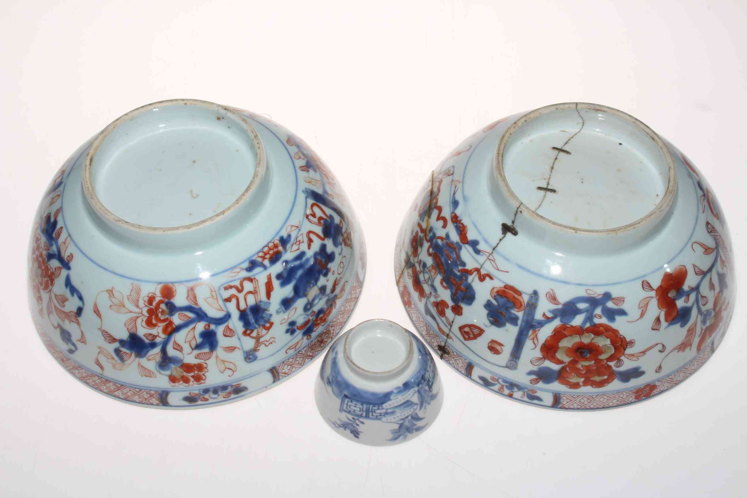 Two antique Chinese blue and iron red bowls and a tea bowl (3). - Image 2 of 2