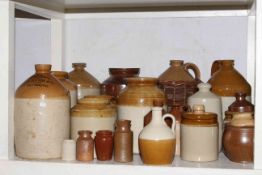 Good collection of stoneware bottles and jars.