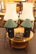 Teak circular coffee table, two pairs of table lamps and shades and two books.