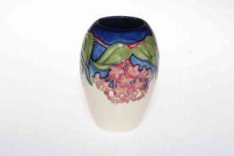 Moorcroft vase designed by Rachel Bishop, Hoya on a blue and green ground, painted by Wendy Mason,