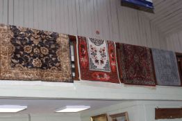 Collection of four various rugs including Chinese.