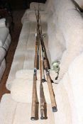 Four fishing rods including Powerflyte Model 3090, E.R. Craddock.