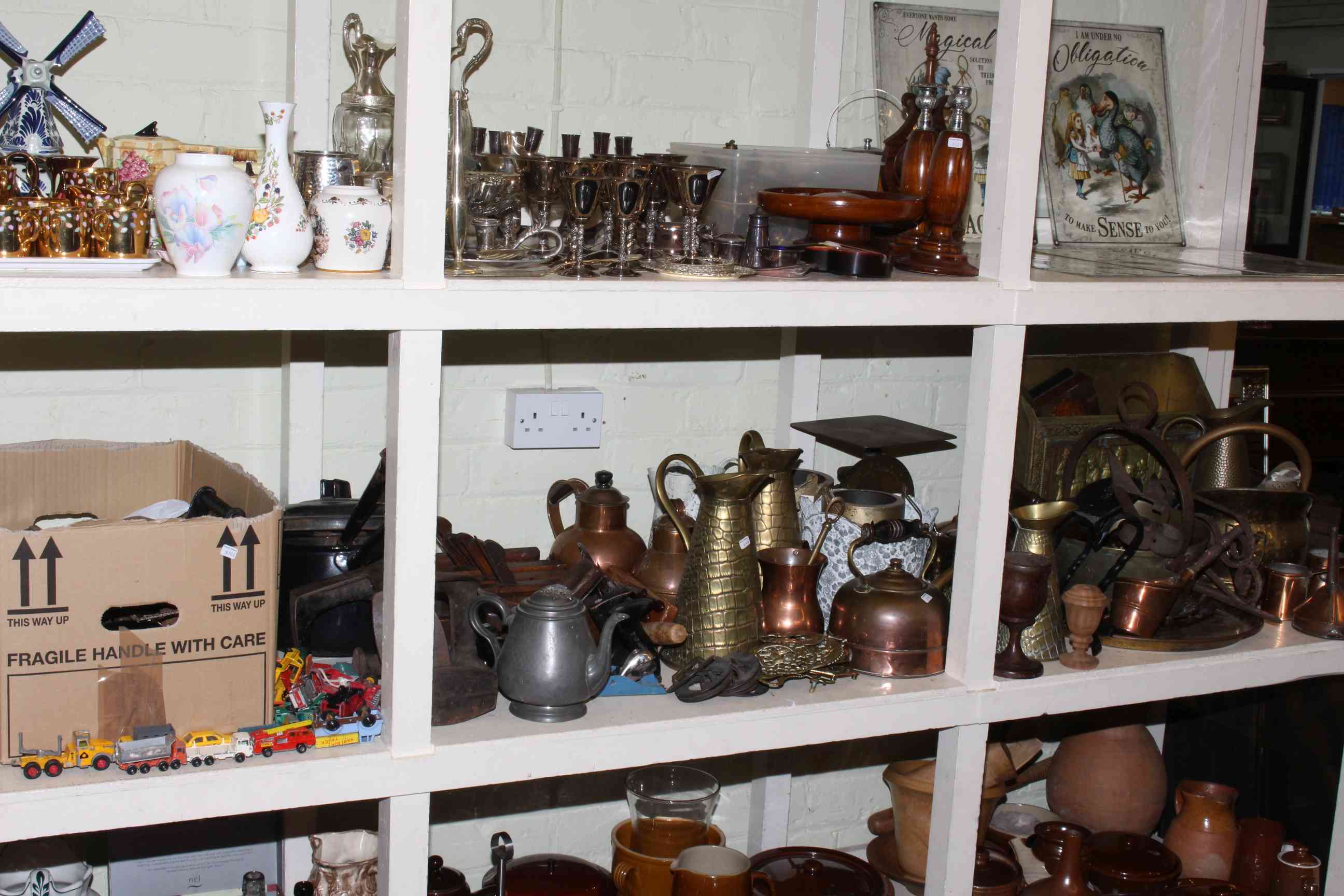 Large collection of copper and brass including horsebrasses, wood planes, shoe lasts,