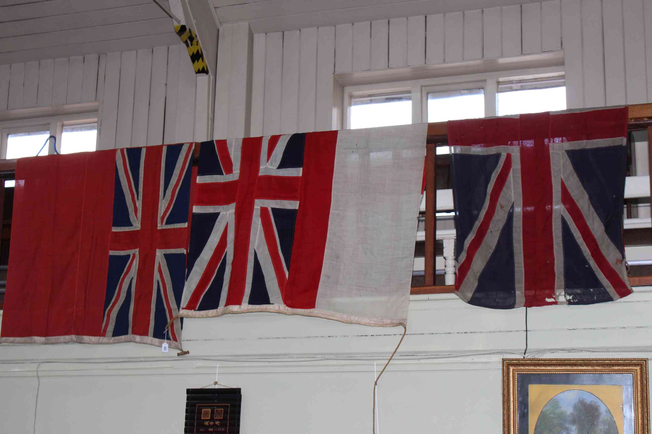 Three hand stitched vintage Naval flags.