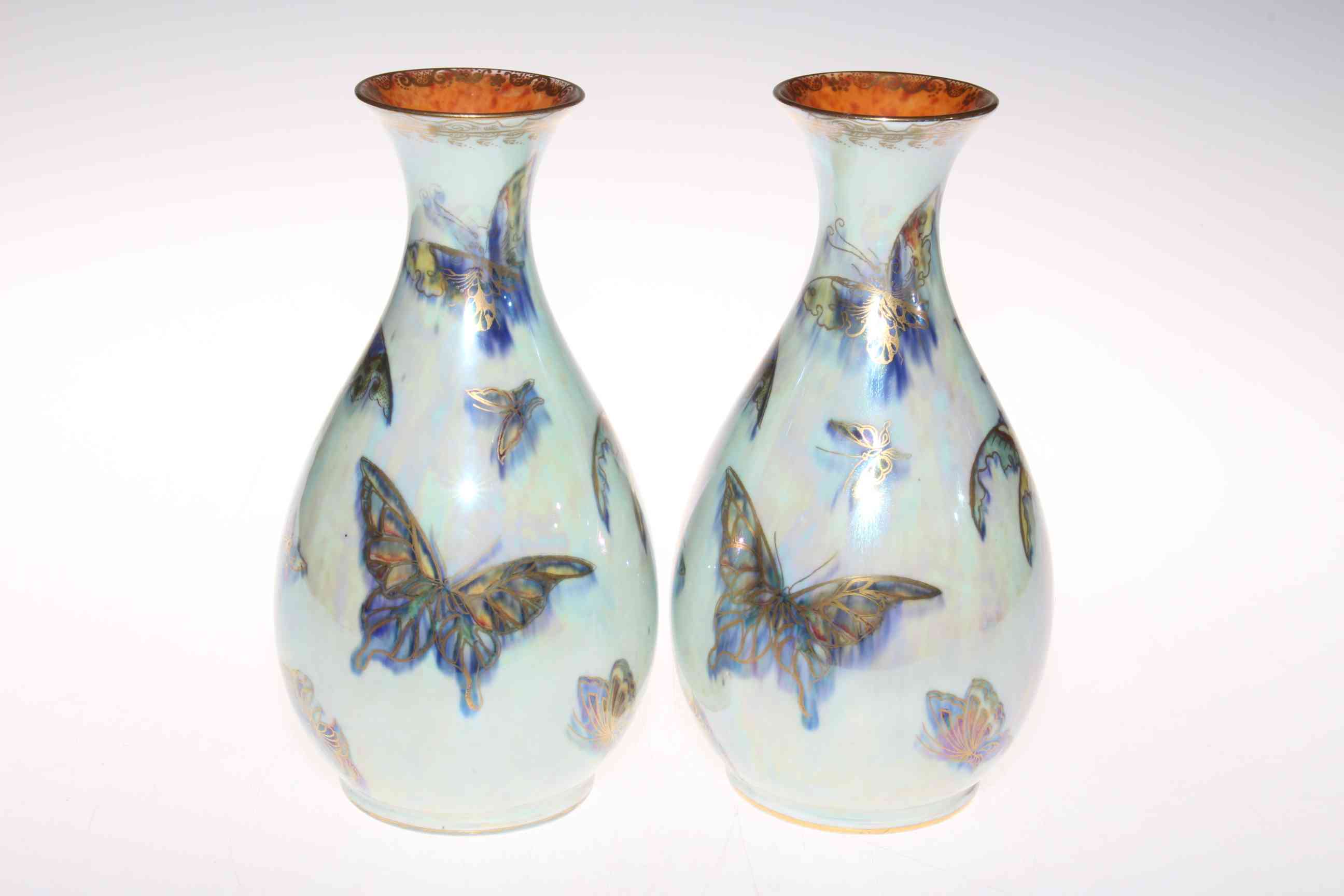 Pair of Wedgwood lustre vases decorated with butterflies, no. 4832, 23cm.
