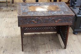 Late 19th Century Chinese hardwood folding scribes desk having two side drawers and profusely