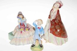 Three Royal Doulton figures, Paisley Shawl, Little Boy Blue and Day Dreams.