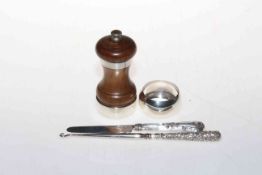 Silver mounted pepper mill, serviette ring, button hook and knife.