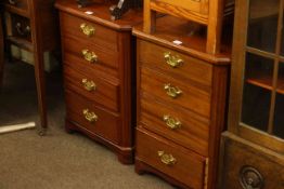 Pair hardwood four drawer pedestal chests.